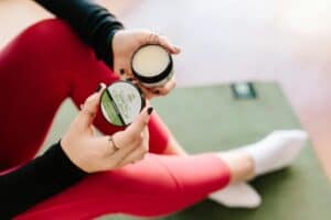 person using CBD ointment