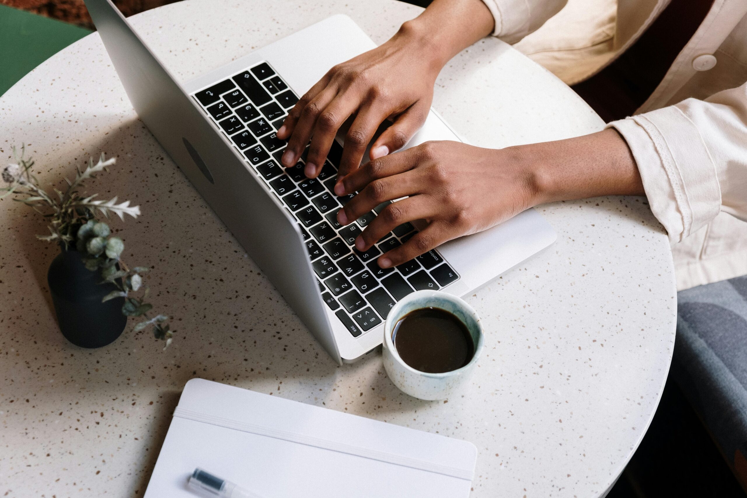 Massive Passive Profits-someone typing on a computer keyboard