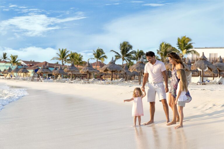 family of 4 on a tropical beach